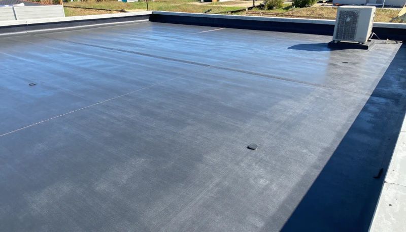 Flat roof membrane repair in progress